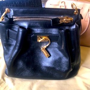 Tom ford leather bag, it has a long strap I just added a short top handle